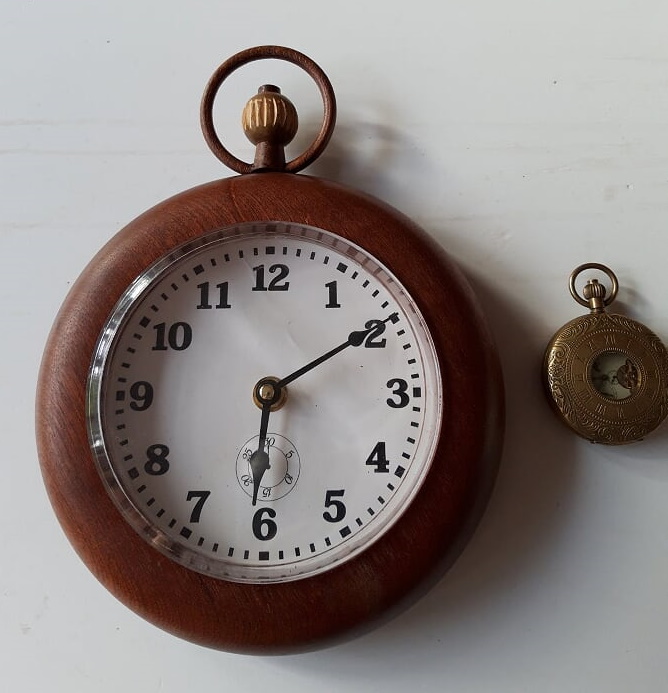 Clock in form of a pocket watch by Dave Matthews